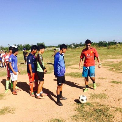 Practicing football kicks